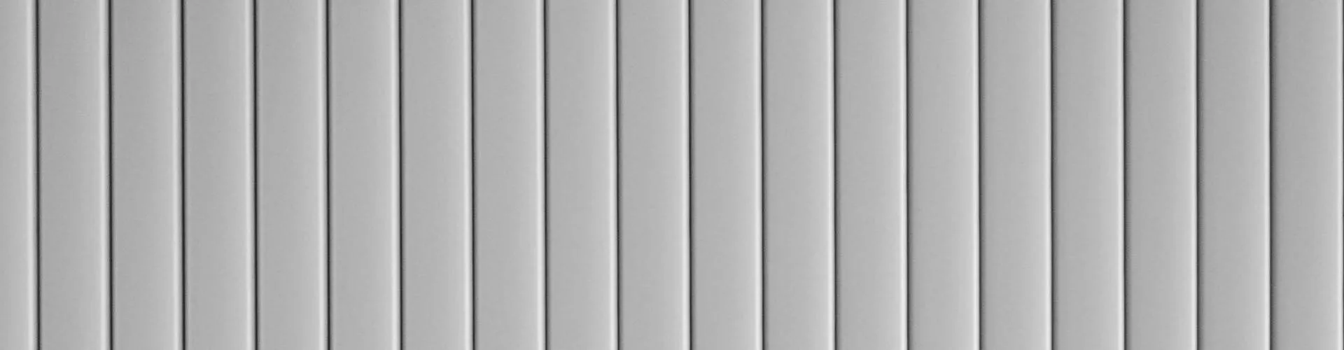 Close-up of light grey metal roofing panels